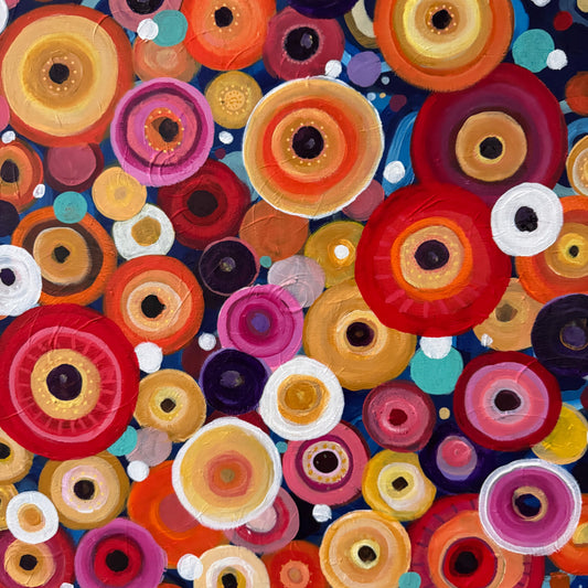 Close-Up: Colorful pattern of circular shapes on a dark background
