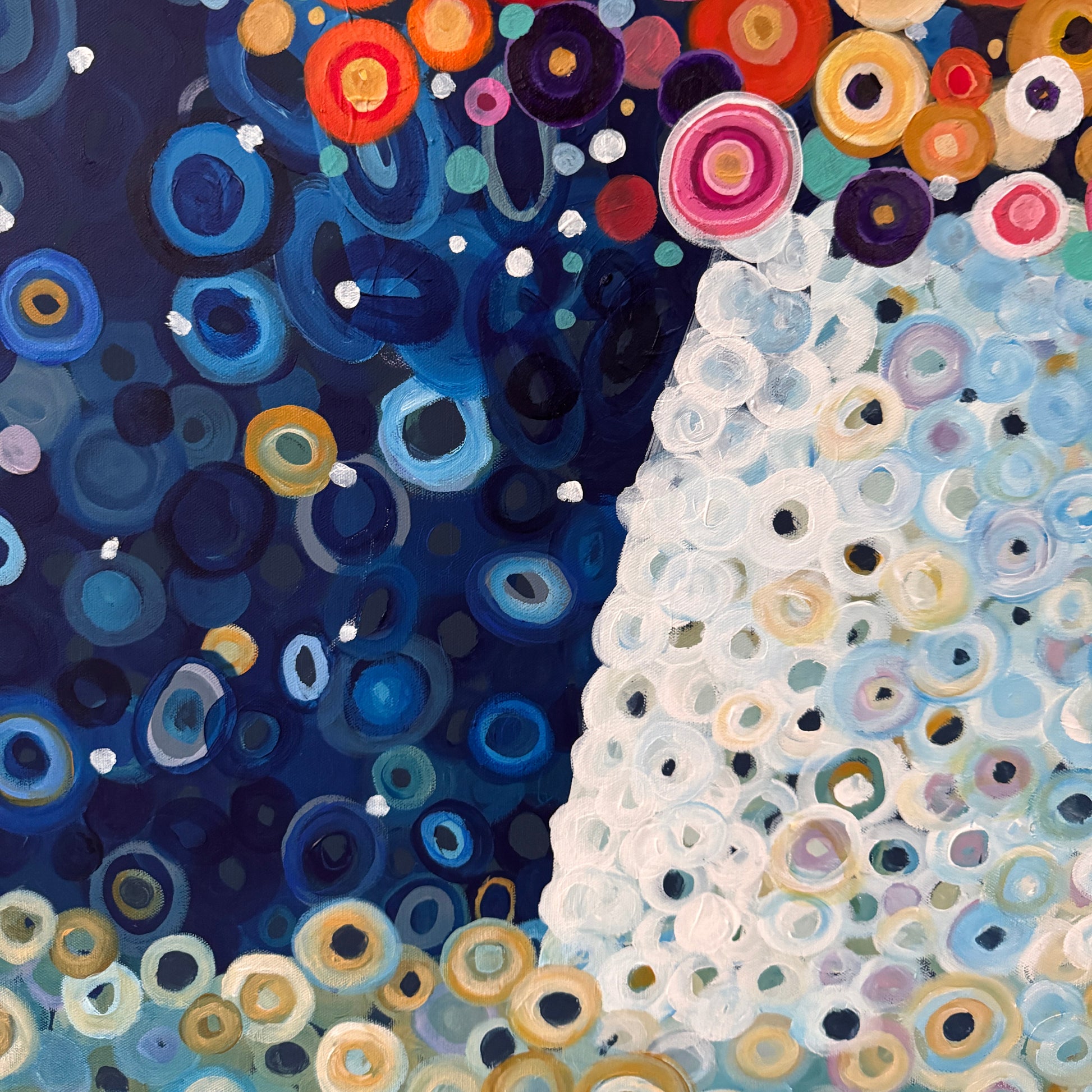 Close-Up: Colourful abstract flowers and translucent vase.
