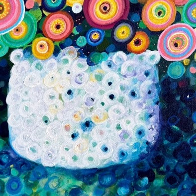 Colorful abstract art with circular patterns and a white central shape.