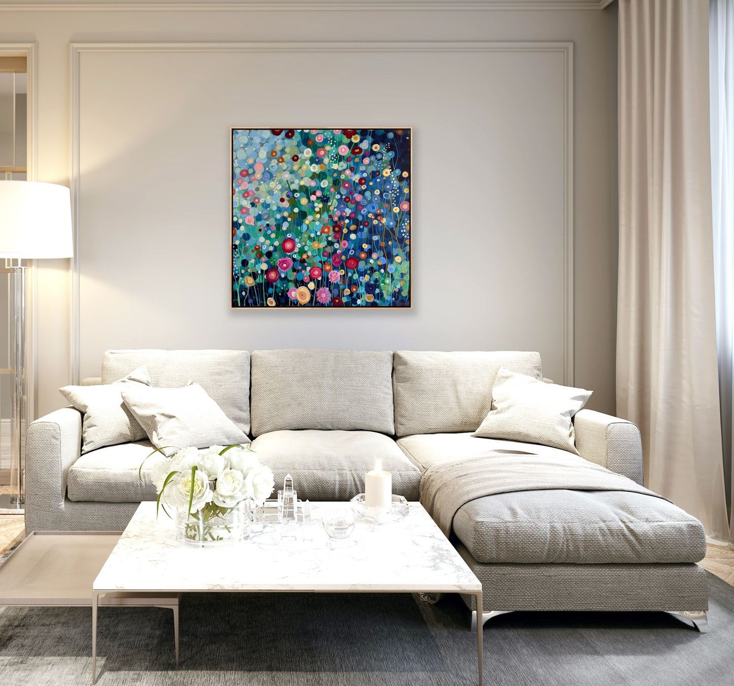 Modern living room with a gray sectional sofa, coffee table, and colorful abstract painting on the wall.