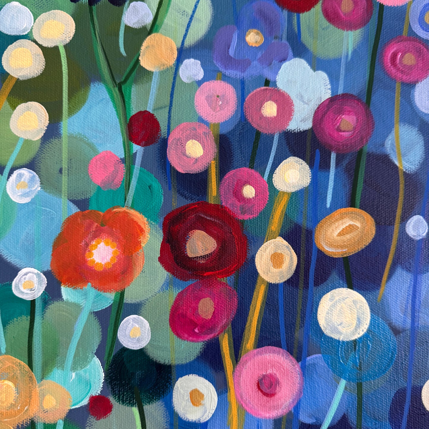 Close-Up: Colourful floral painting with various flowers on a blue background